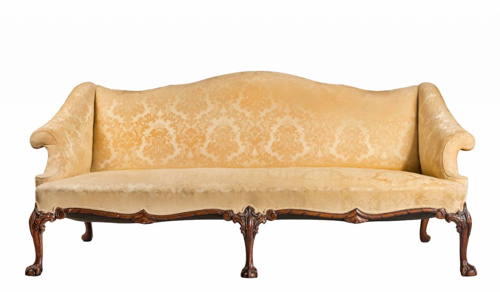 cream camelback sofa