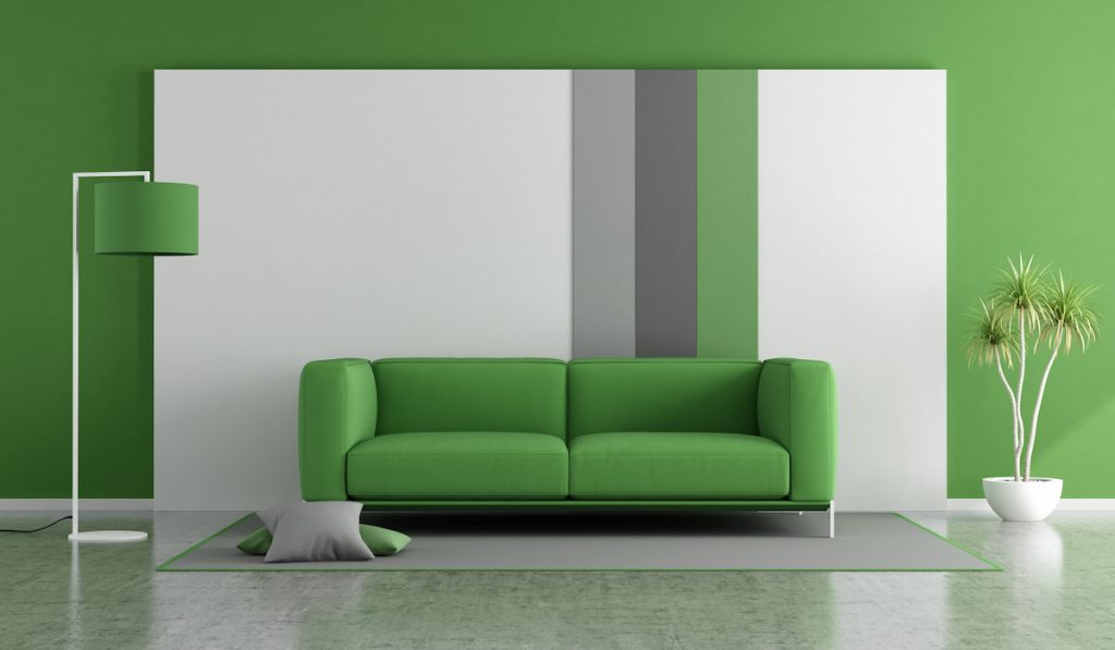 green sofa in a minimalist space