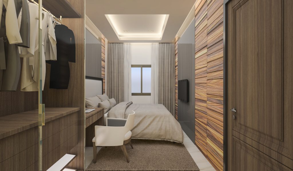 small bedroom with recessed lighting