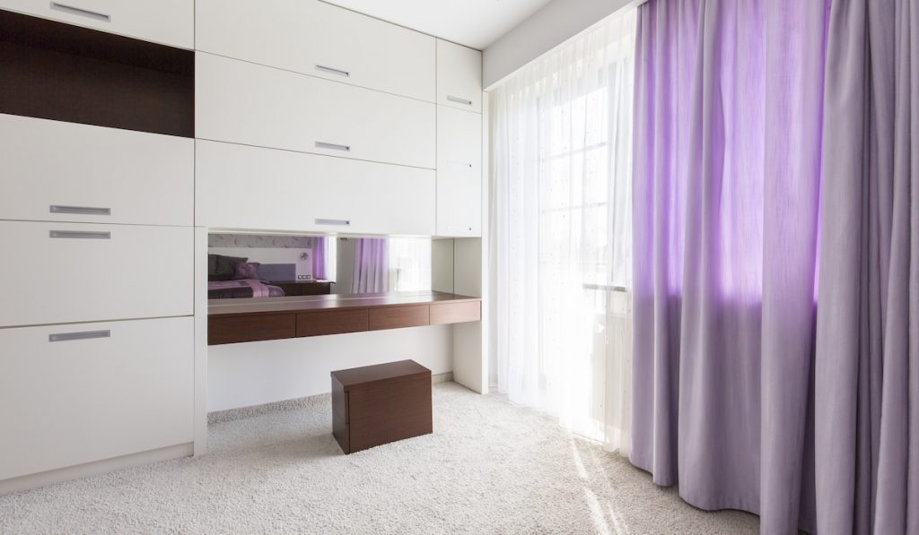 purple and white curtains in the bedroom