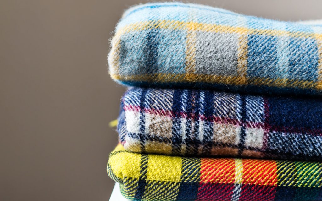 stack of woolen blankets